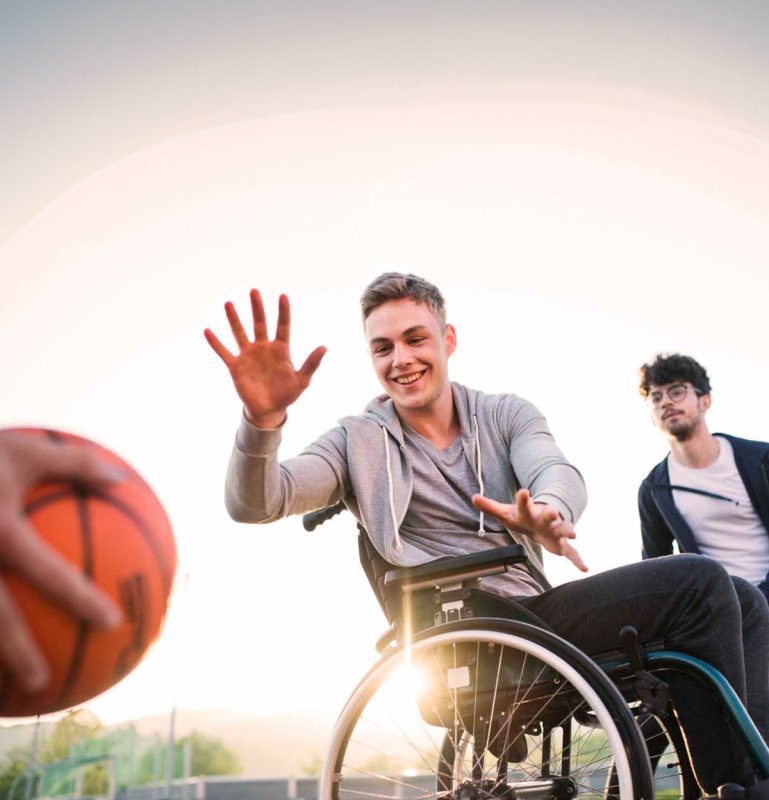 boy-in-a-wheelchair--playing-basketball